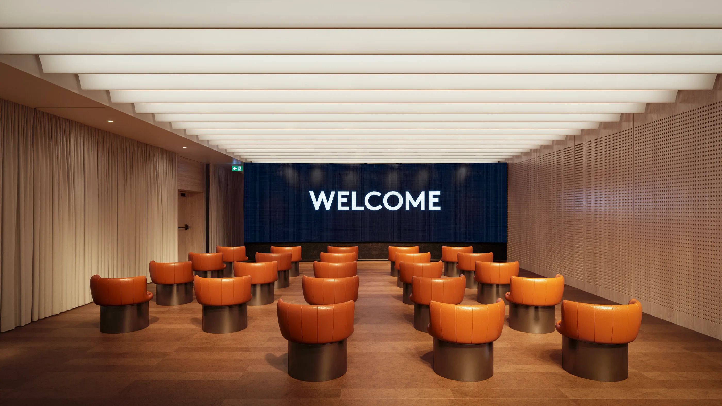 Rendered Presentation Room with a screen reading Welcome above rows of orange chairs.