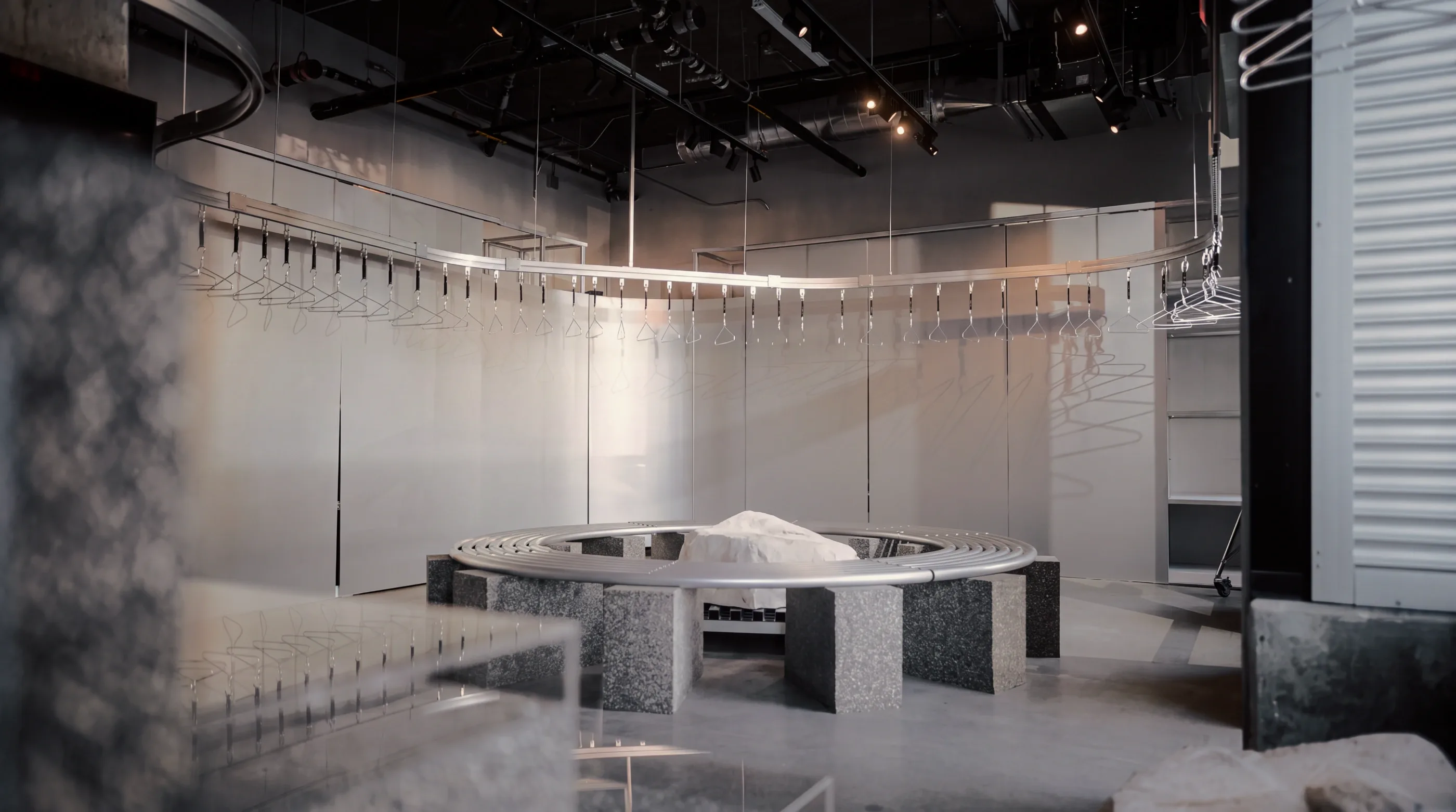 Store interior study: the material palette and central display.