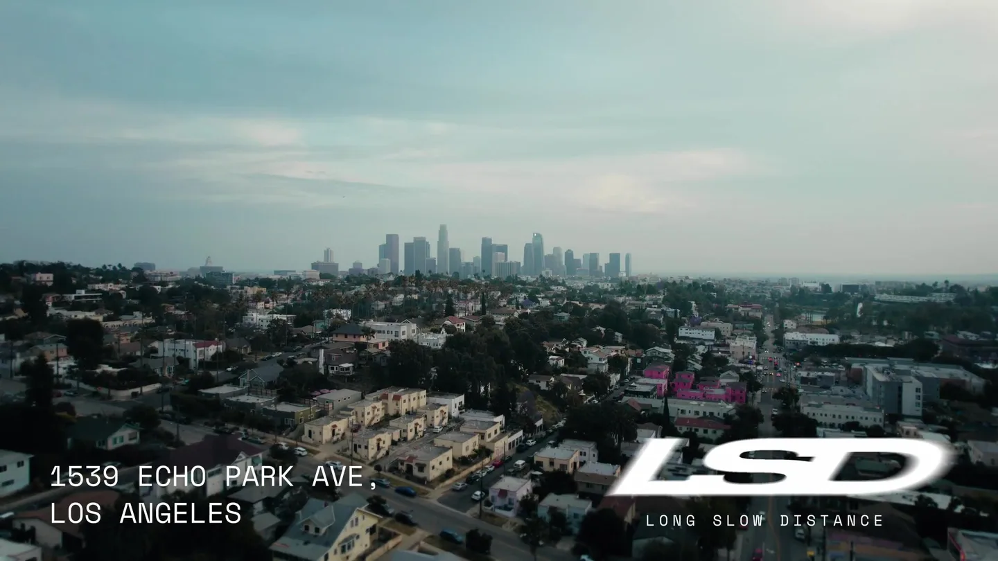 Los Angeles skyline with the LSD wordmark and Long Slow Distance tagline overlaid.